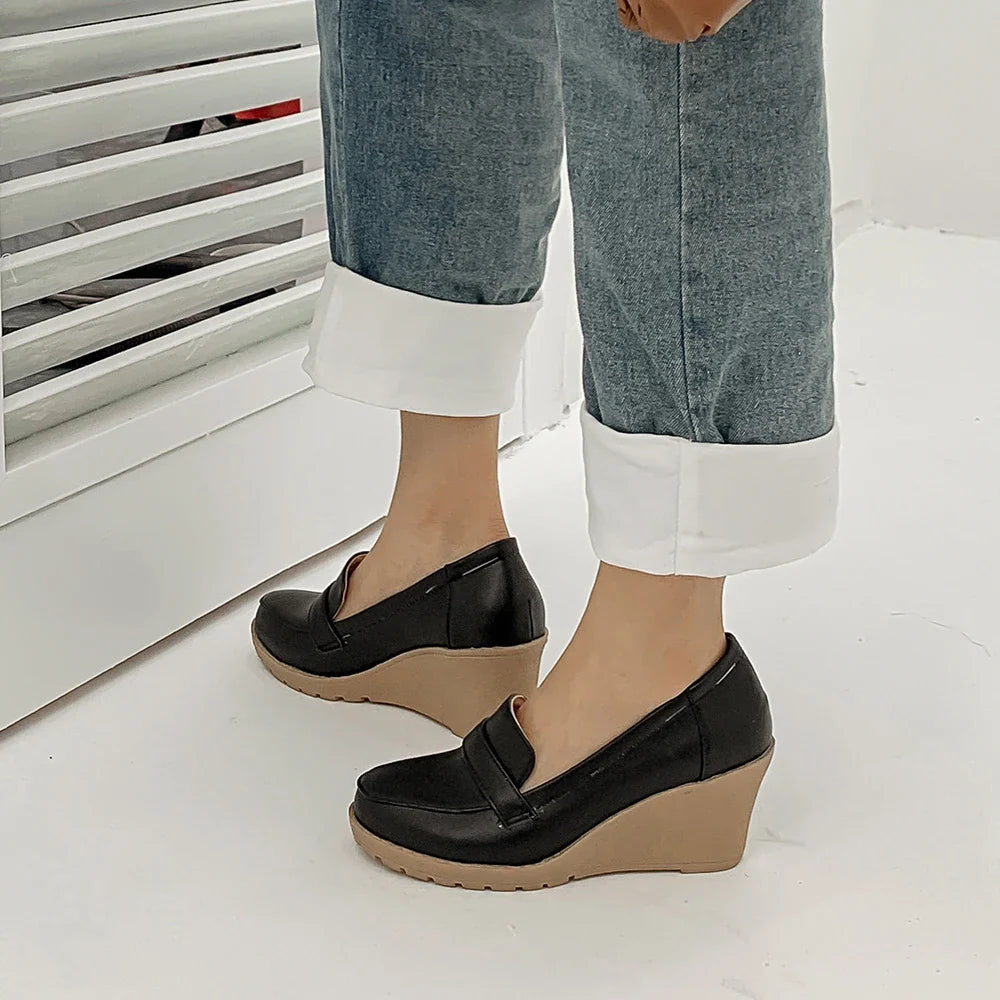 Understated Florian Leather Wedge Loafers