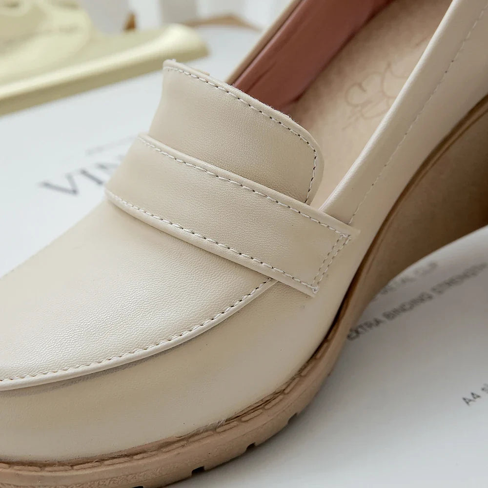 Understated Florian Leather Wedge Loafers