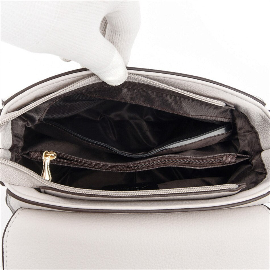 Sculpted Leather Phone Bag