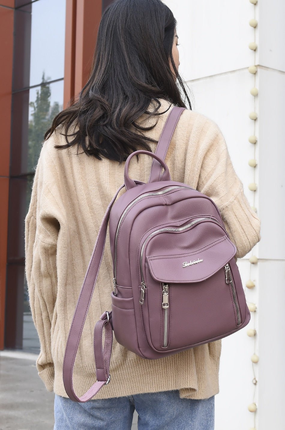 Leather Backpack with Round Detail