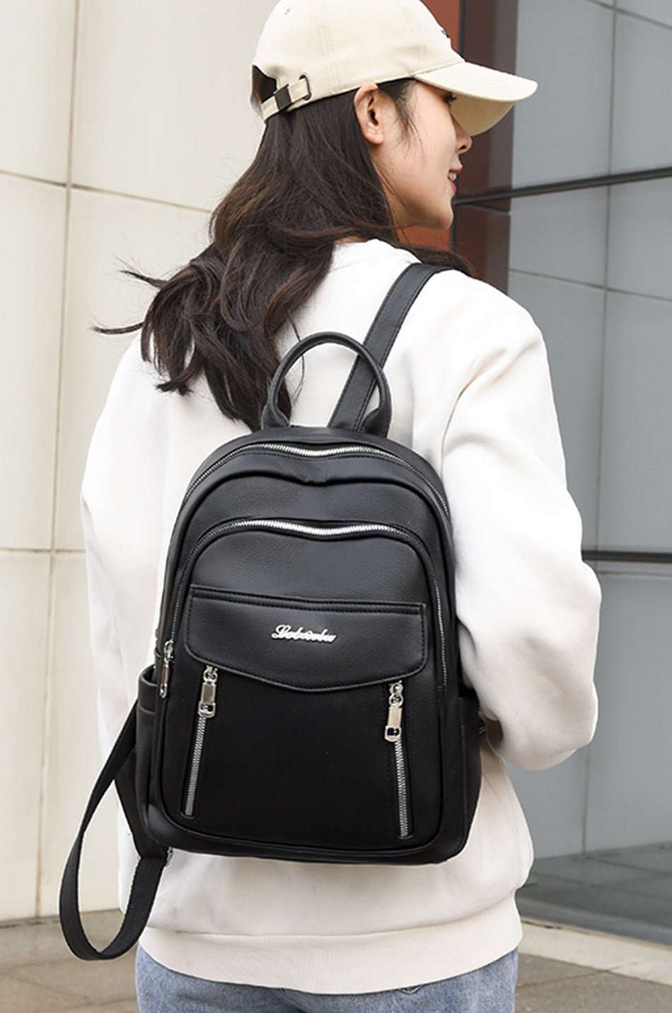 Leather Backpack with Round Detail
