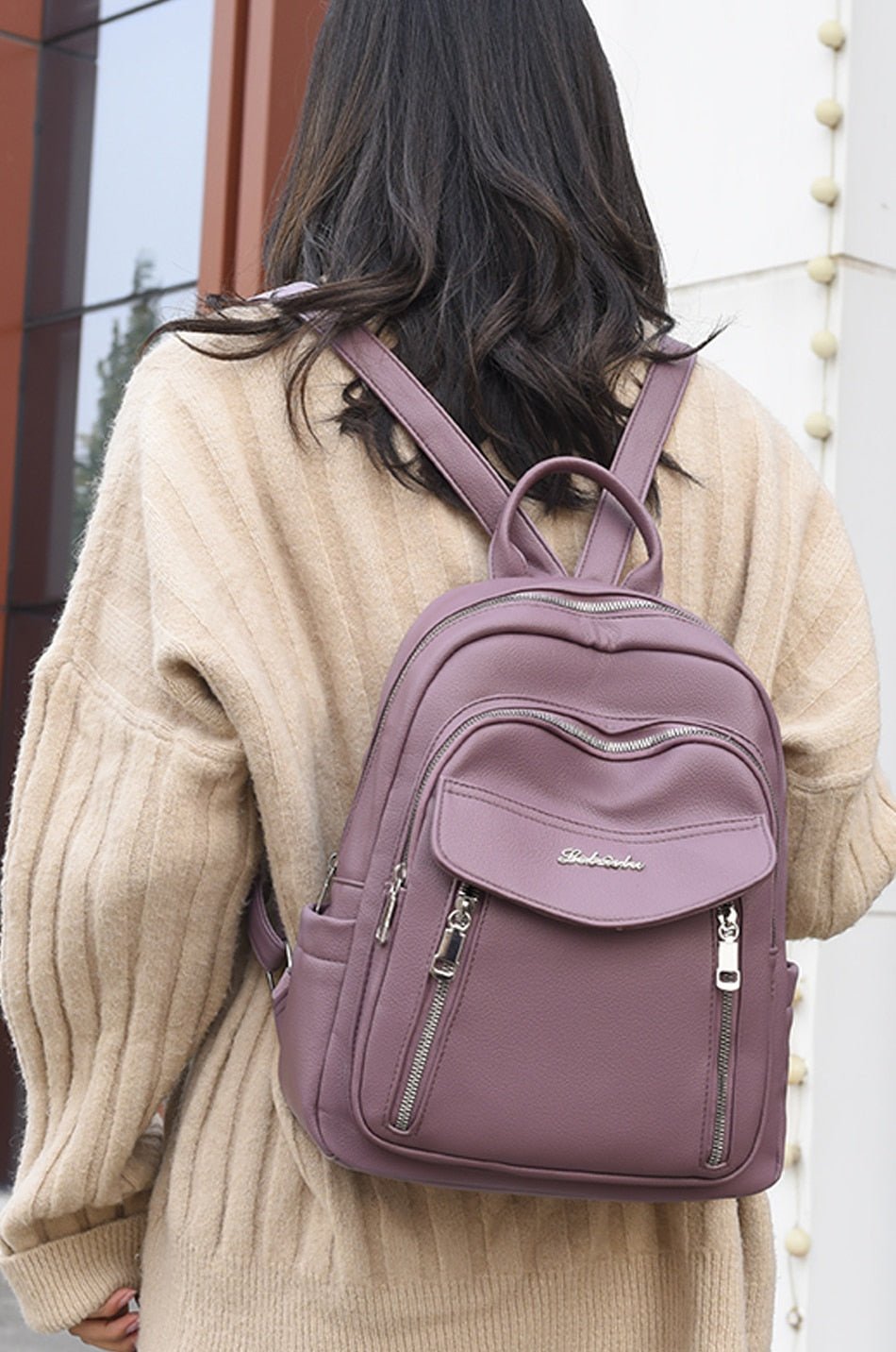 Leather Backpack with Round Detail