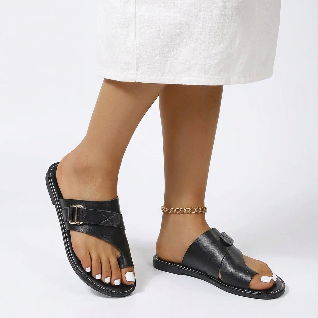 Sleek Norali Asymmetric-Strap Leather Mules